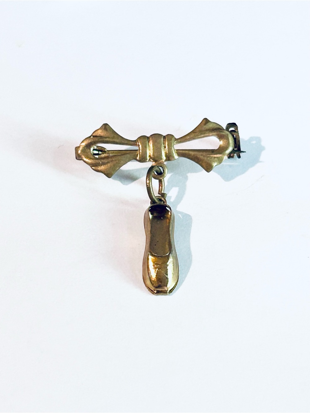 Gold Tone Bow Brooch with Dangle Ballet Shoe Charm